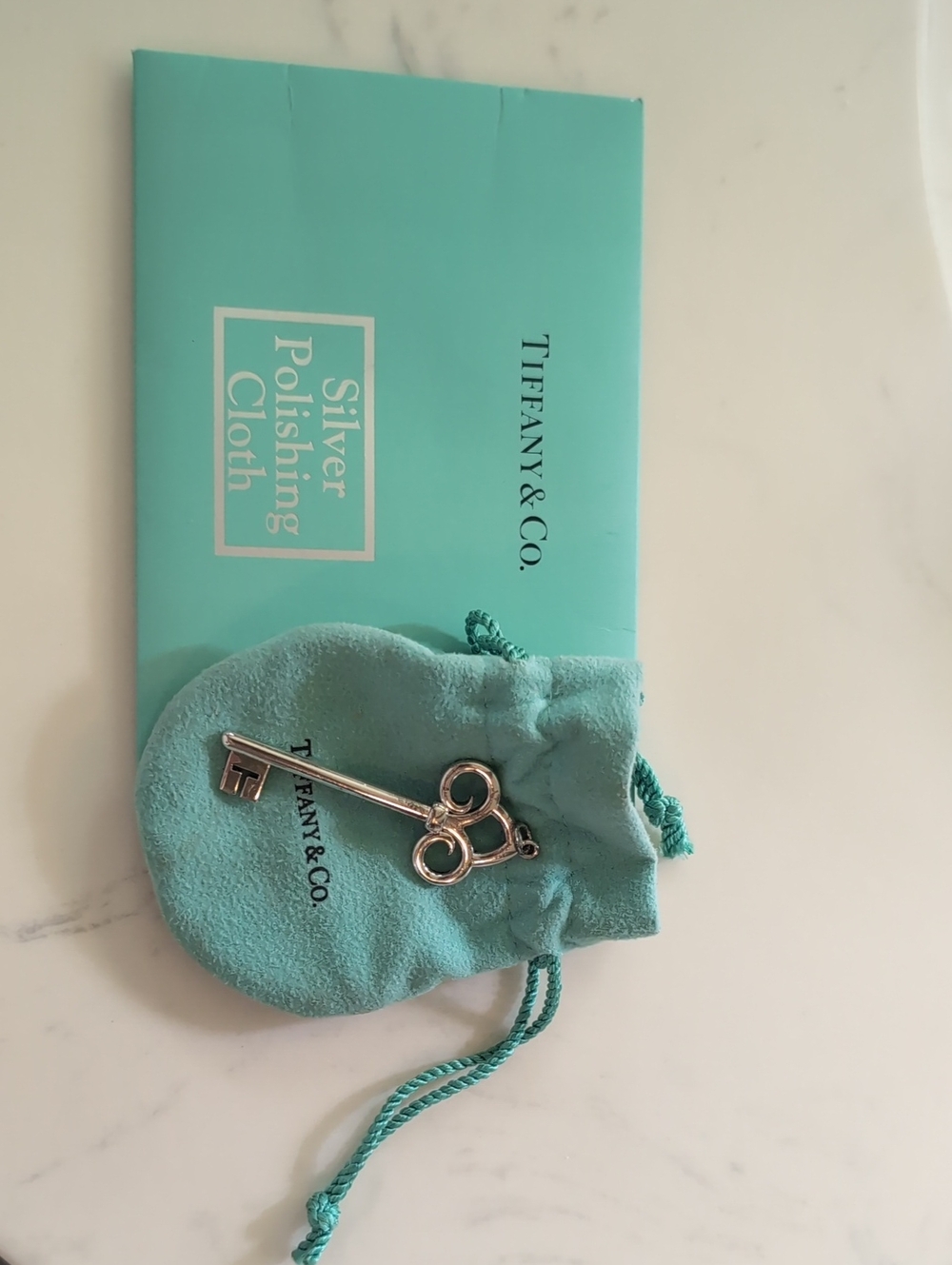 Tiffany & Co. Silver Key Charm with Tiffany Blue Pouch